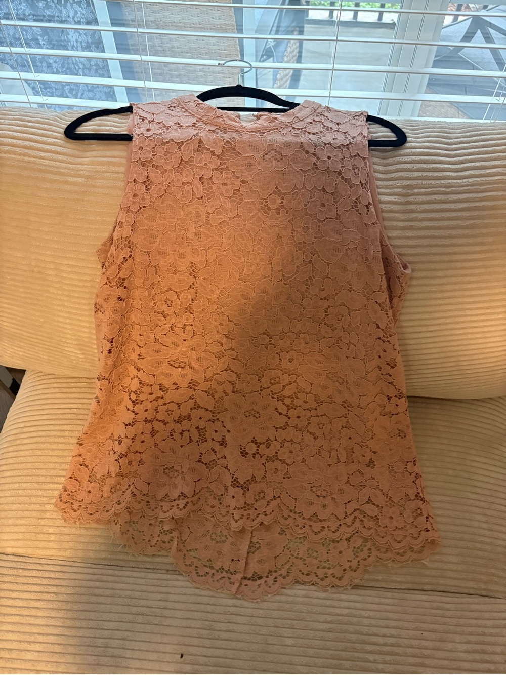 Sleeveless pink blouse
